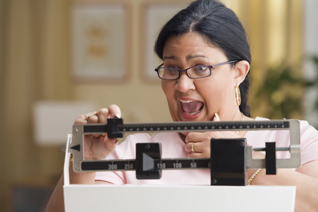 Woman on a weight scale