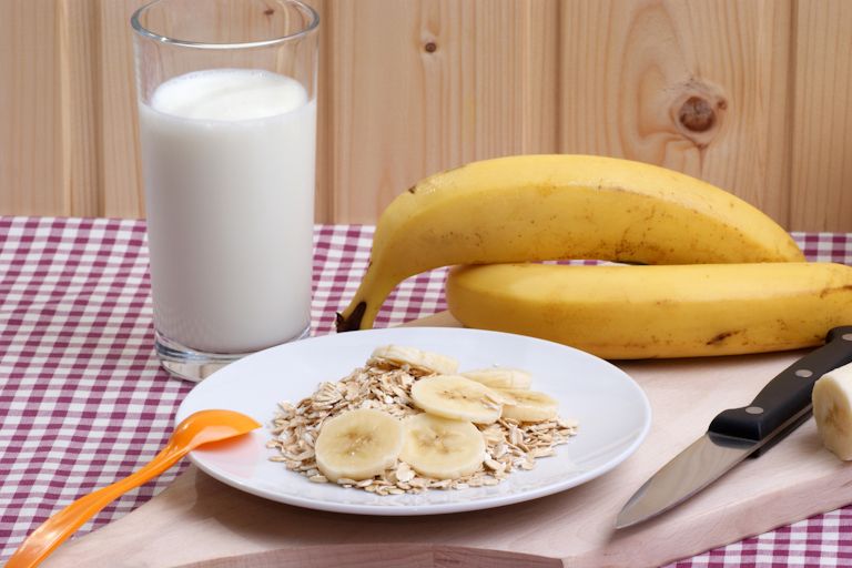 Breakfast with organic oatmeal and fresh bananas