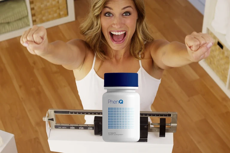 Woman celebrating weight loss with  PhenQ